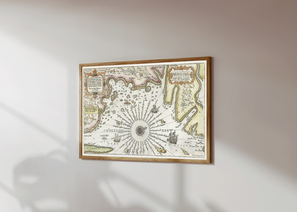Framed art print of Coast of Sweden between Kalmar… by Joannes van Doetechum the Elder, in a light wood frame on a sunlit white wall, seen at a slight angle