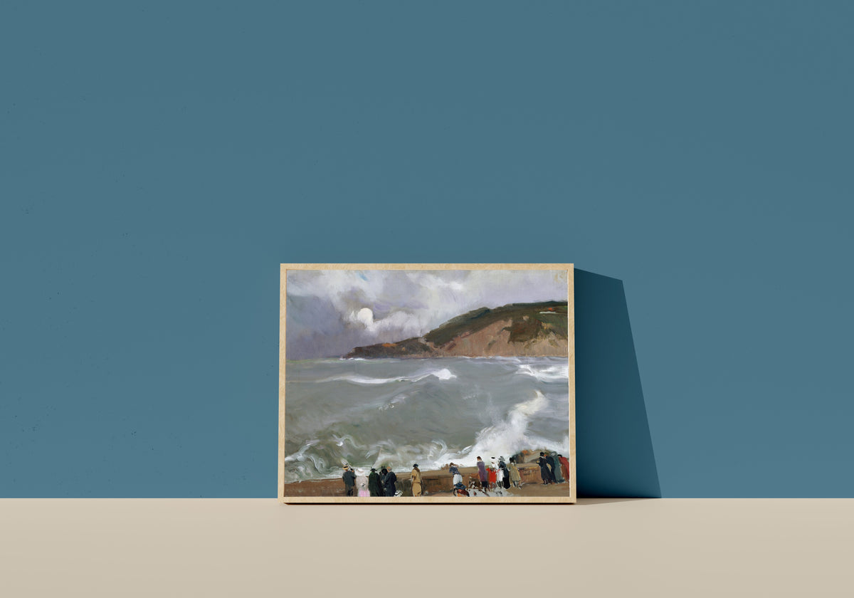 Framed art print of Breakwater, San Sebastián by Joaquín Sorolla, in a light wood frame leaning on a blue wall