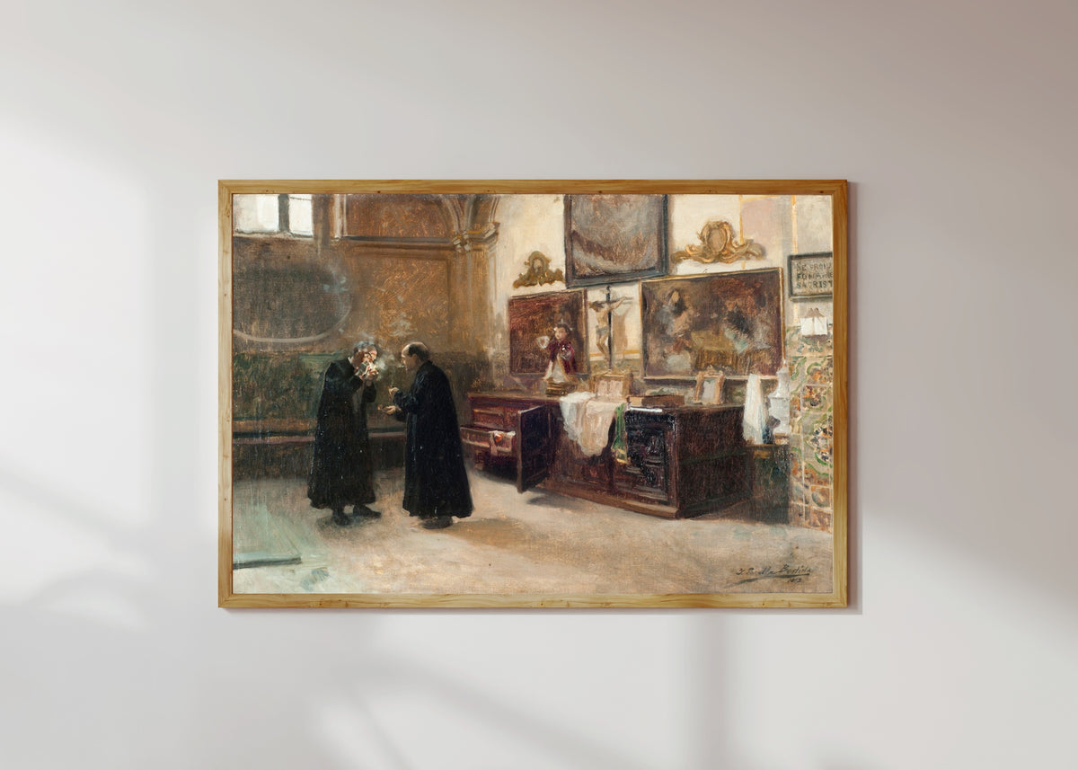 Framed art print of In the Sacristy (En la sacristía) by Joaquín Sorolla, in a light wood frame on a sunlit white wall