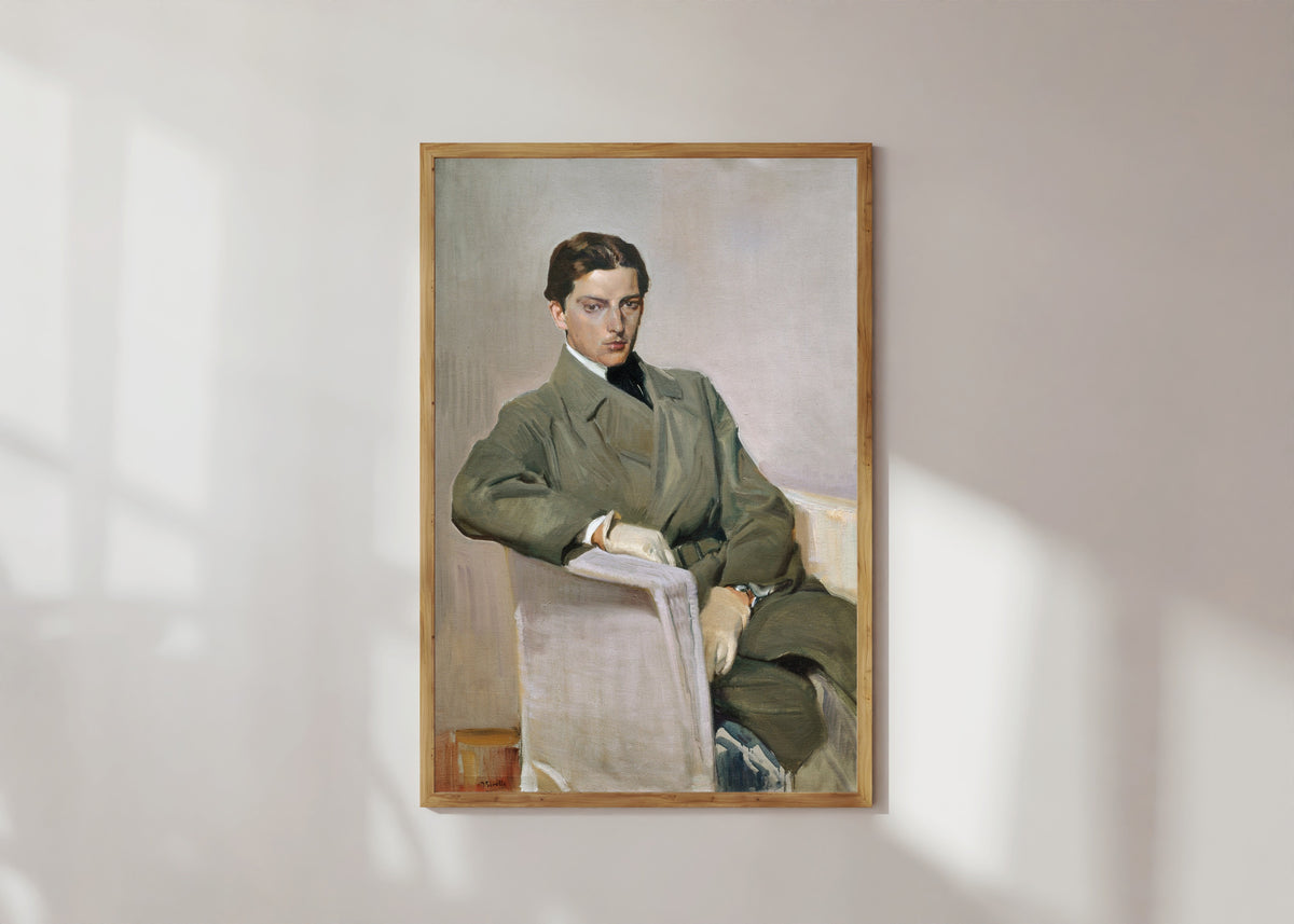 Framed art print of Joaquín by Joaquín Sorolla, in a light wood frame on a sunlit white wall