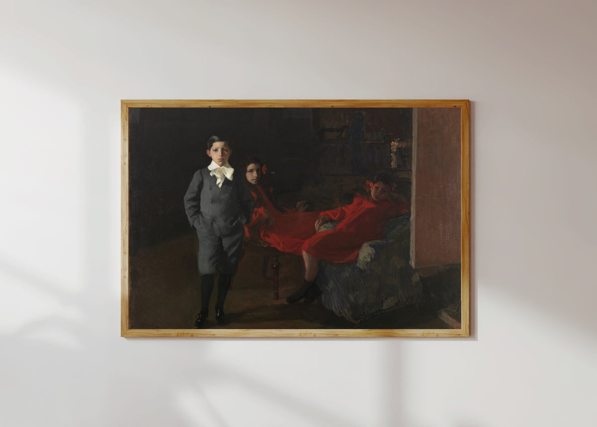 Framed art print of My Children by Joaquín Sorolla, in a light wood frame on a sunlit white wall
