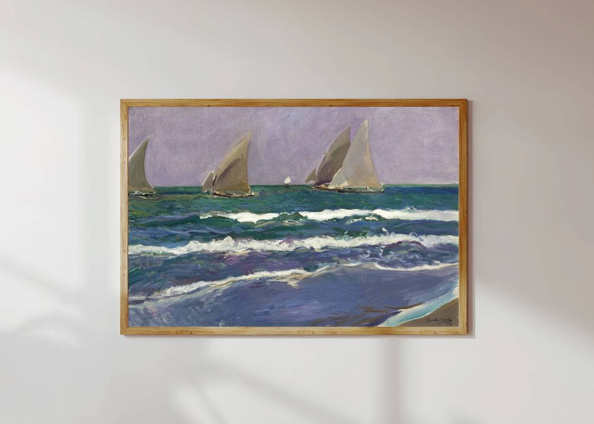 Framed art print of Sails at Sea, Valencia (Velas en el mar) by Joaquín Sorolla, in a light wood frame on a sunlit white wall