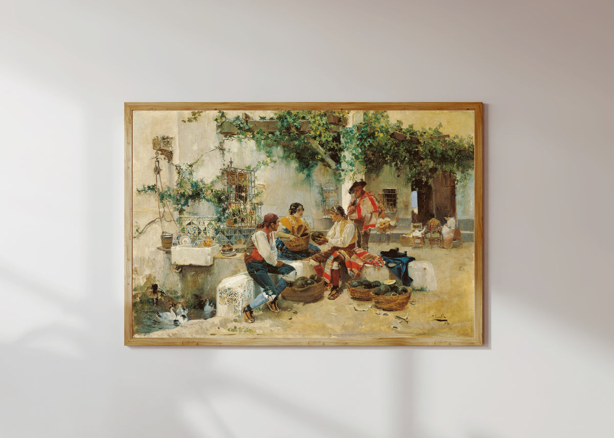 Framed art print of Selling Melons by Joaquín Sorolla, in a light wood frame on a sunlit white wall