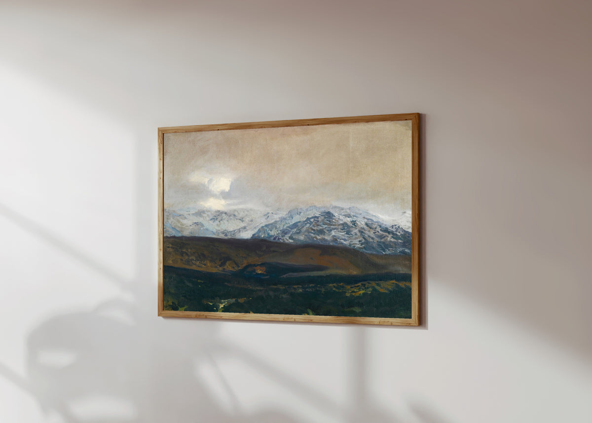 Framed art print of The Sierra de Guadarrama by Joaquín Sorolla, in a light wood frame on a sunlit white wall, seen at a slight angle
