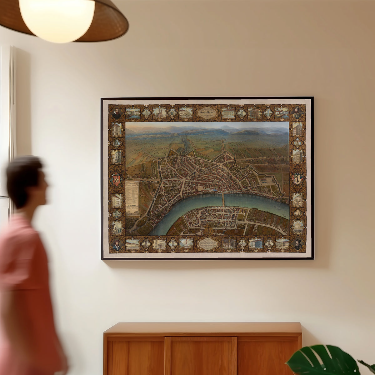 Framed art print of Malerischer Plan der Stadt Basel by Johann Friedrich Maehly, in a slim black frame on a warm wall in a sunlit room