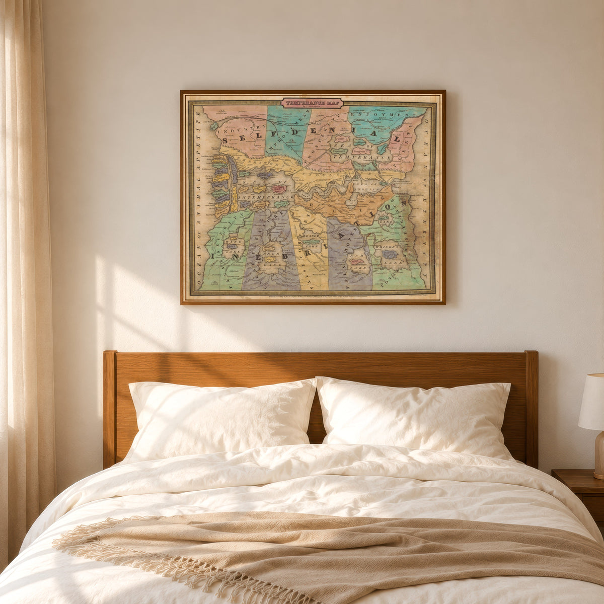 Framed art print of Temperance Map by John Christian Wiltberger Jr., in a slim wood frame above a bed in a sunlit bedroom