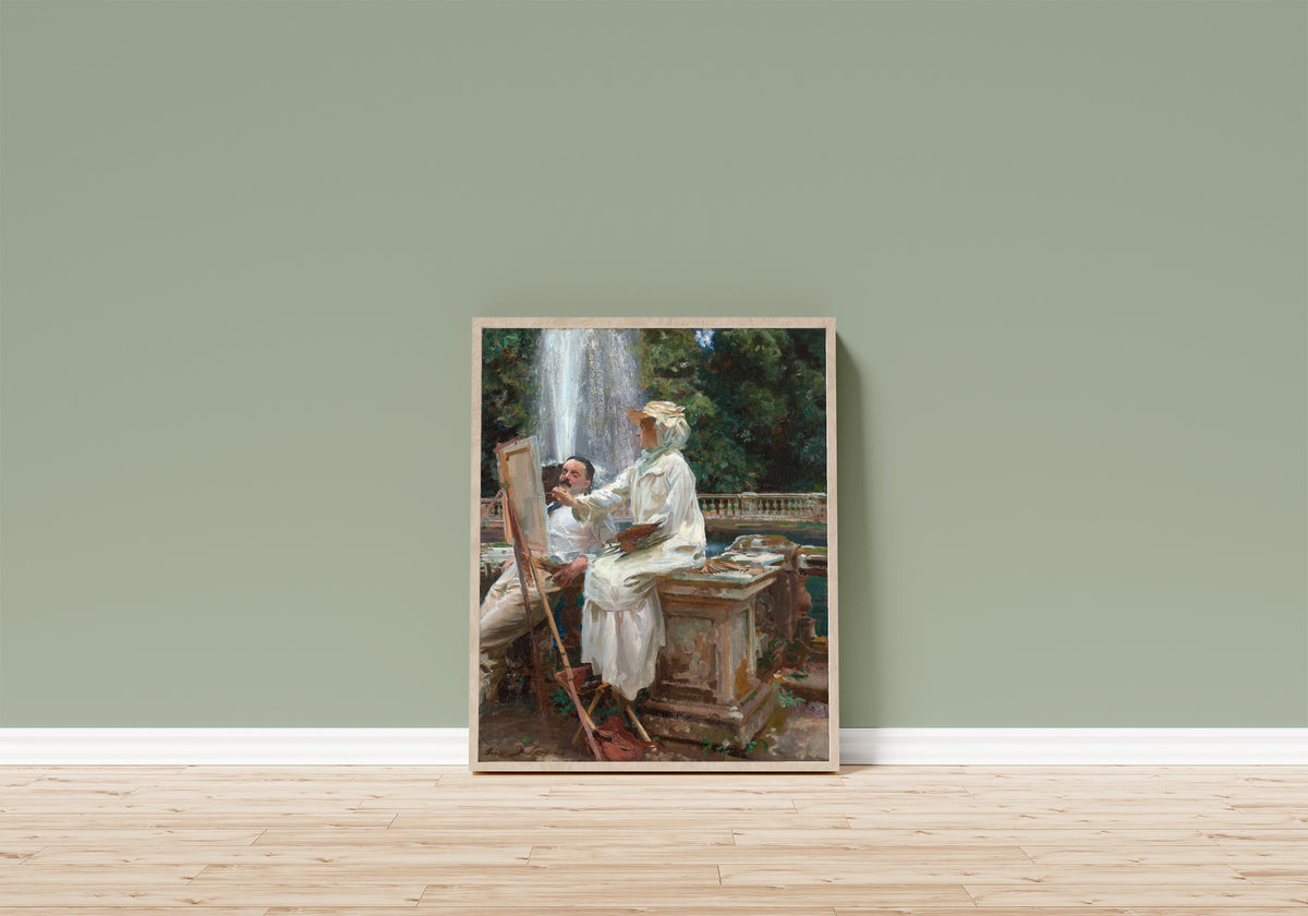 Framed art print of The Fountain, Villa Torlonia, Frascati by John Singer Sargent, in a light wood frame leaning on a sage green wall above a wooden floor