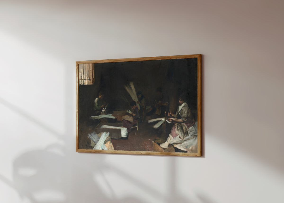 Framed art print of Venetian Glass Workers by John Singer Sargent, in a light wood frame on a sunlit white wall, seen at a slight angle