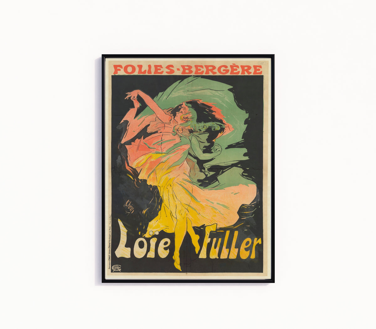 Framed art print of Folies-Bergère, Loïe Fuller by Jules Chéret, in a slim black frame on a plain white wall