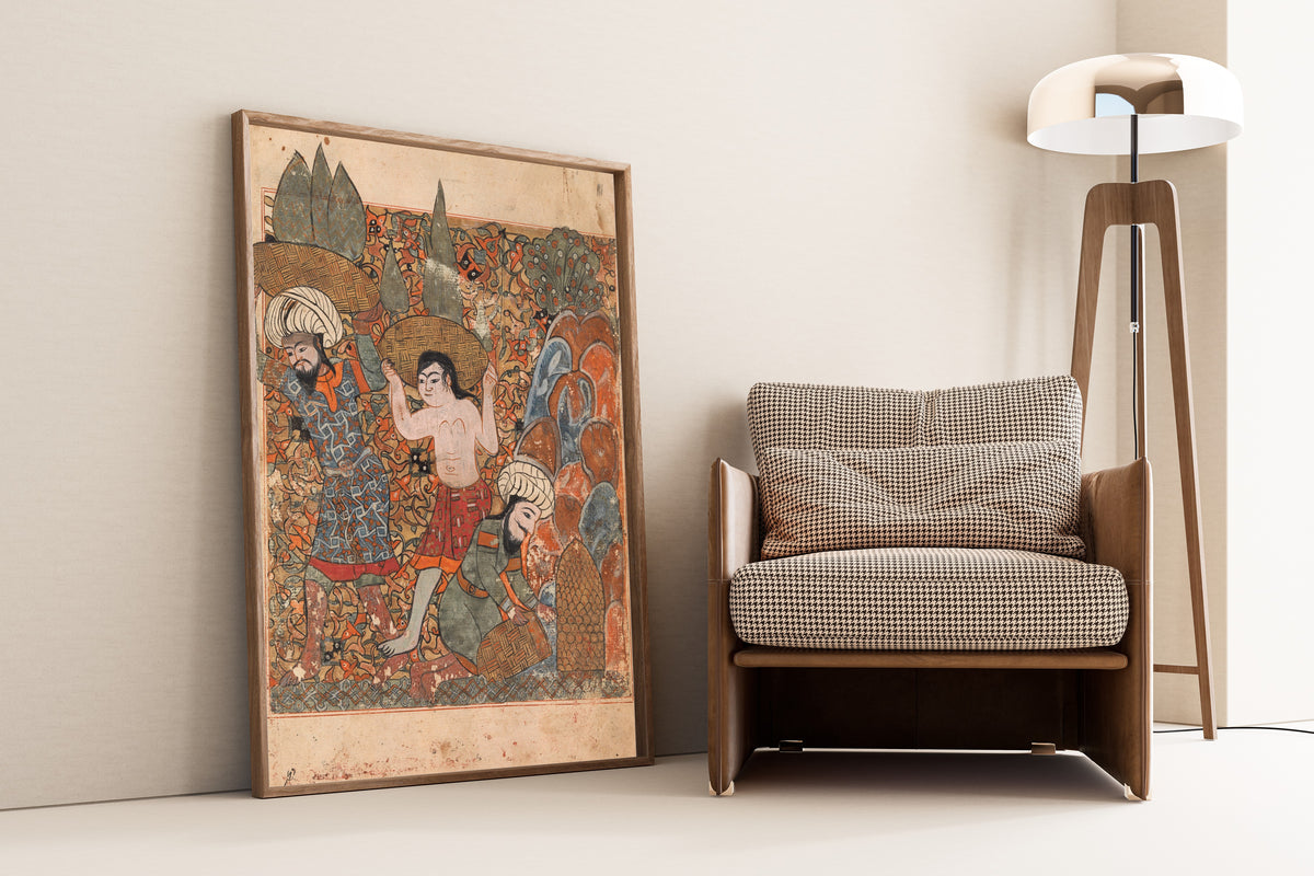 Framed art print of Kalila wa Dimna: The Man who Discovers the Treasure has it Carried Away by…, leaning against a wall beside an armchair and a floor lamp