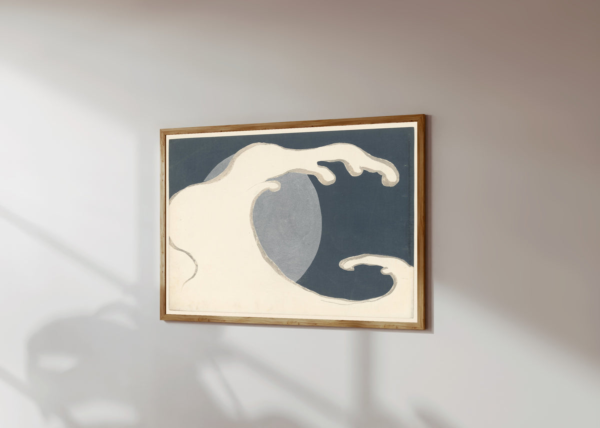 Framed art print of High Wave (Hoge golf) by Kamisaka Sekka, in a light wood frame on a sunlit white wall, seen at a slight angle