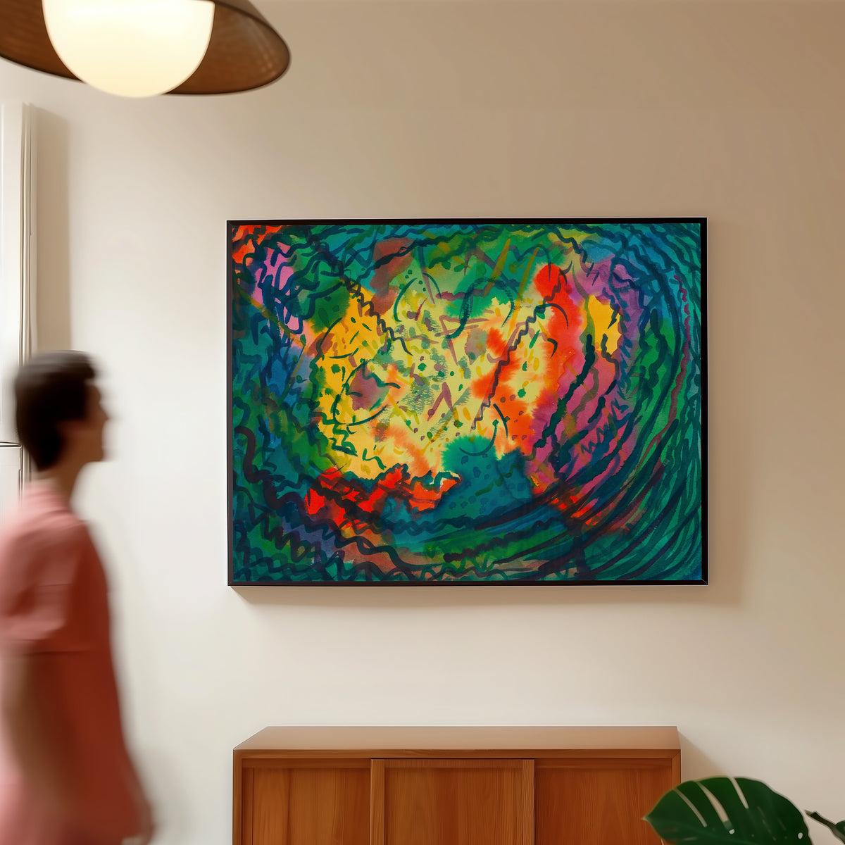 Framed art print of Auflösung (Dissolution) by Karl Wiener, in a slim black frame on a warm wall in a sunlit room