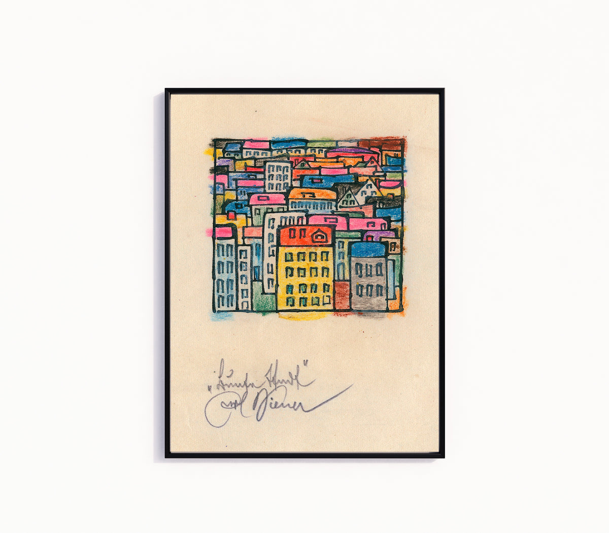 Framed art print of Bunte Stadt (Colourful City) by Karl Wiener, in a slim black frame on a plain white wall