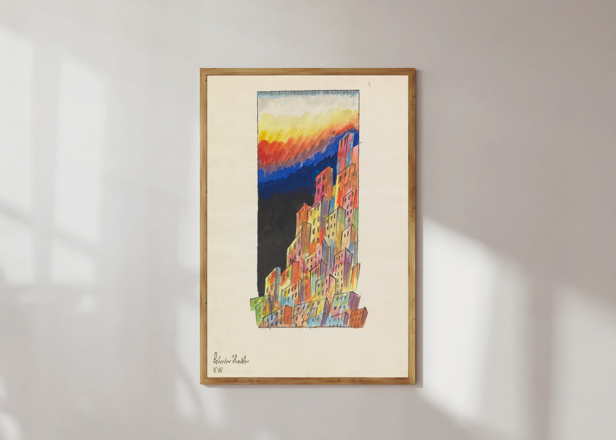 Framed art print of Bunte Stadt (Colourful City, Towers) by Karl Wiener, in a light wood frame on a sunlit white wall