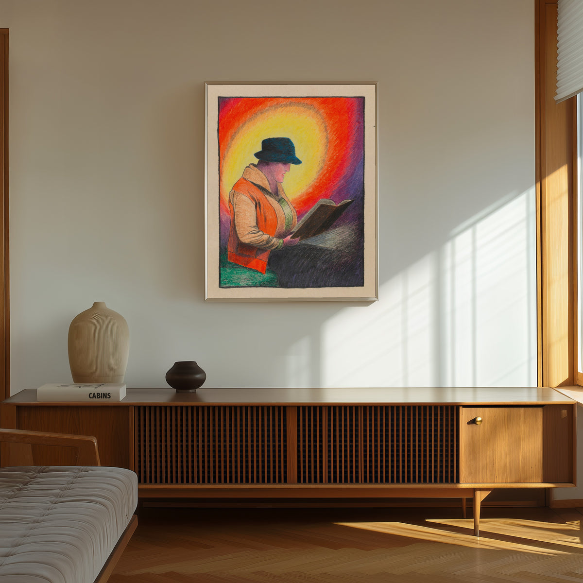 Framed art print of Dame im Kafé (Lady in the Café) by Karl Wiener, in a thin light frame on a sunlit wall above a wooden sideboard