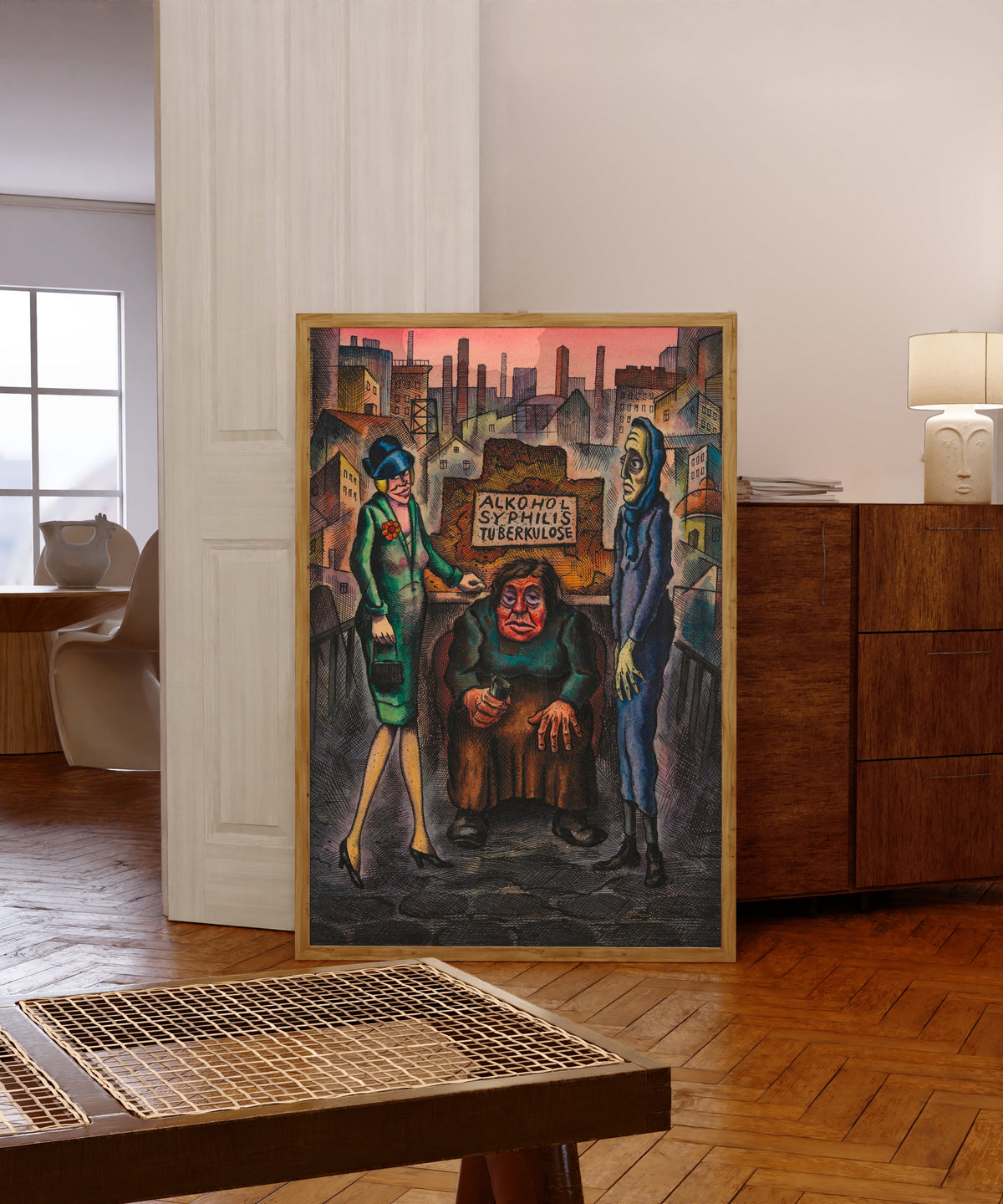 Framed art print of Die drei Volksseuchen (The Three Plagues) by Karl Wiener, in a light wood frame leaning in a warm room with a parquet floor