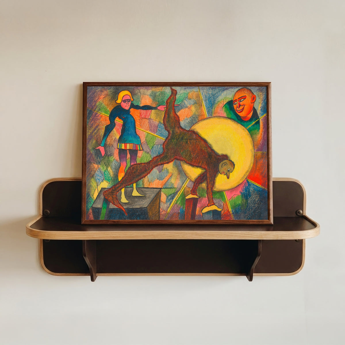 Framed art print of Groteske (Grotesque) by Karl Wiener, in a dark wood frame resting on a wall shelf