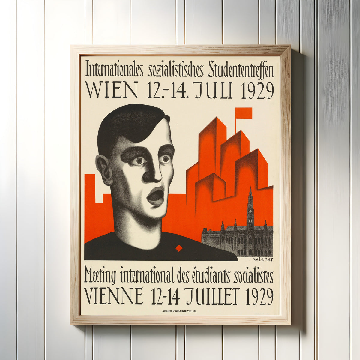 Framed art print of Internationales sozialistisches Studententreffen (International Socialist… by Karl Wiener, in a light wood frame on a white panelled wall