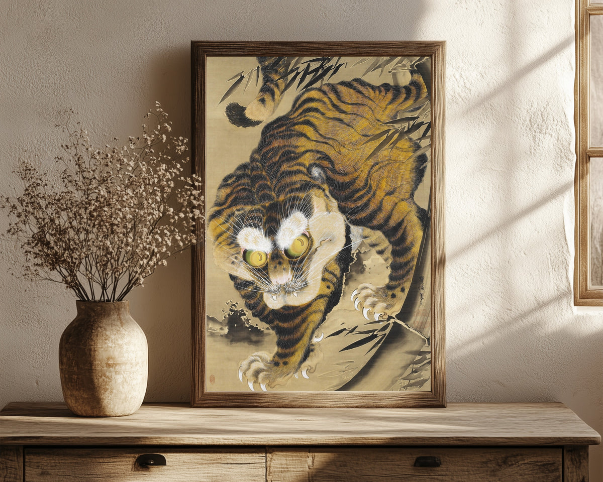 Framed art print of Tiger by Katayama Yokoku, in a dark wood frame leaning on a rustic console beside dried flowers