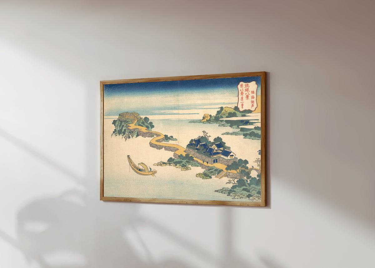 Framed art print of Eight Views of the Ryūkyū Islands: Sound of… by Katsushika Hokusai, in a light wood frame on a sunlit white wall, seen at a slight angle