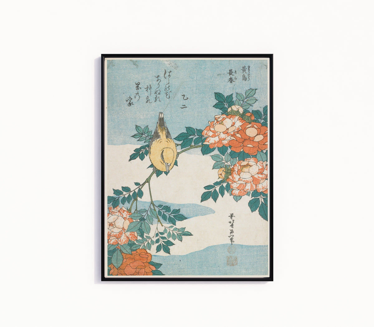 Framed art print of Warbler and Roses by Katsushika Hokusai, in a slim black frame on a plain white wall