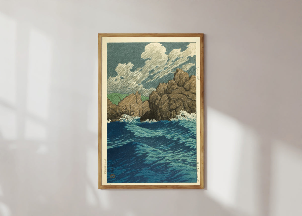 Framed art print of Hachinohe Same by Kawase Hasui, in a light wood frame on a sunlit white wall