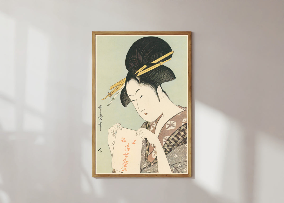 Framed art print of Crackers, Special Feature of the Shop by Kitagawa Utamaro, in a light wood frame on a sunlit white wall