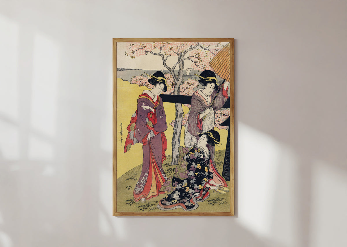 Framed art print of Gotenyama no Hanami Hidari by Kitagawa Utamaro, in a light wood frame on a sunlit white wall