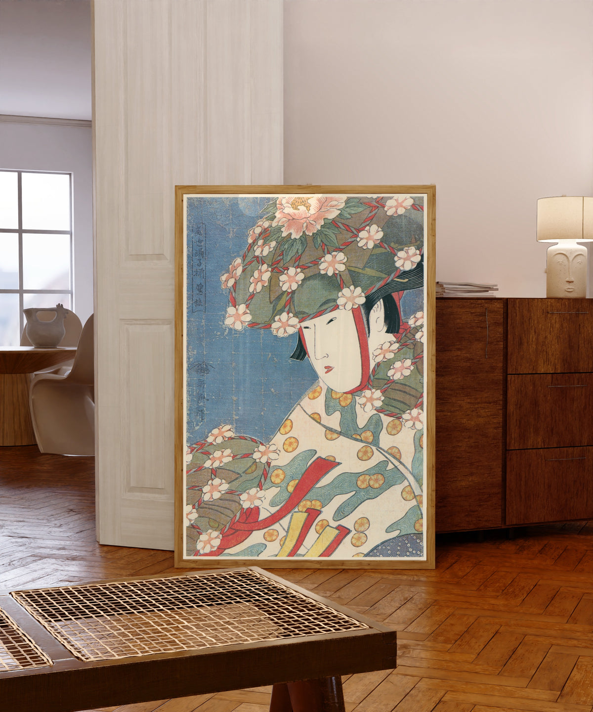 Framed art print of Modern Dancers – Heron Girl by Kitagawa Utamaro, in a light wood frame leaning in a warm room with a parquet floor
