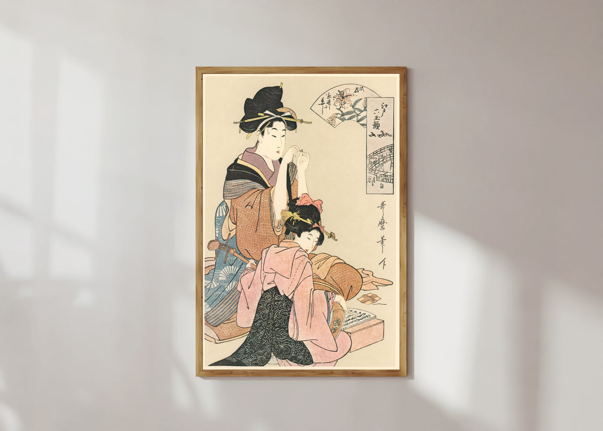 Framed art print of Six Beauties of Edo by Kitagawa Utamaro, in a light wood frame on a sunlit white wall