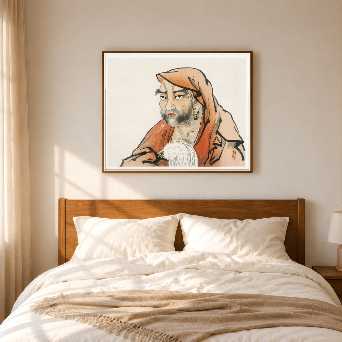 Framed art print of Daruma (Bodhidharma) with a horsetail whisk by Kōno Bairei, in a slim wood frame above a bed in a sunlit bedroom