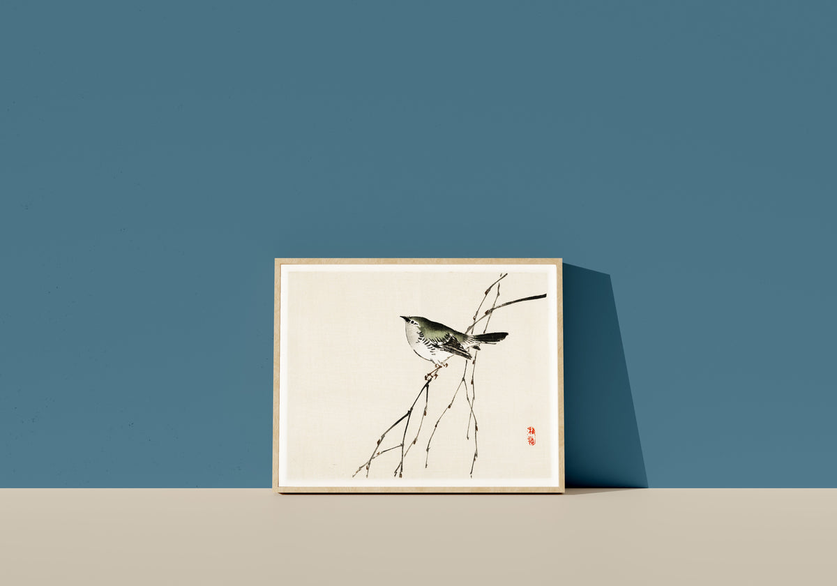Framed art print of Tit by Kōno Bairei, in a light wood frame leaning on a blue wall
