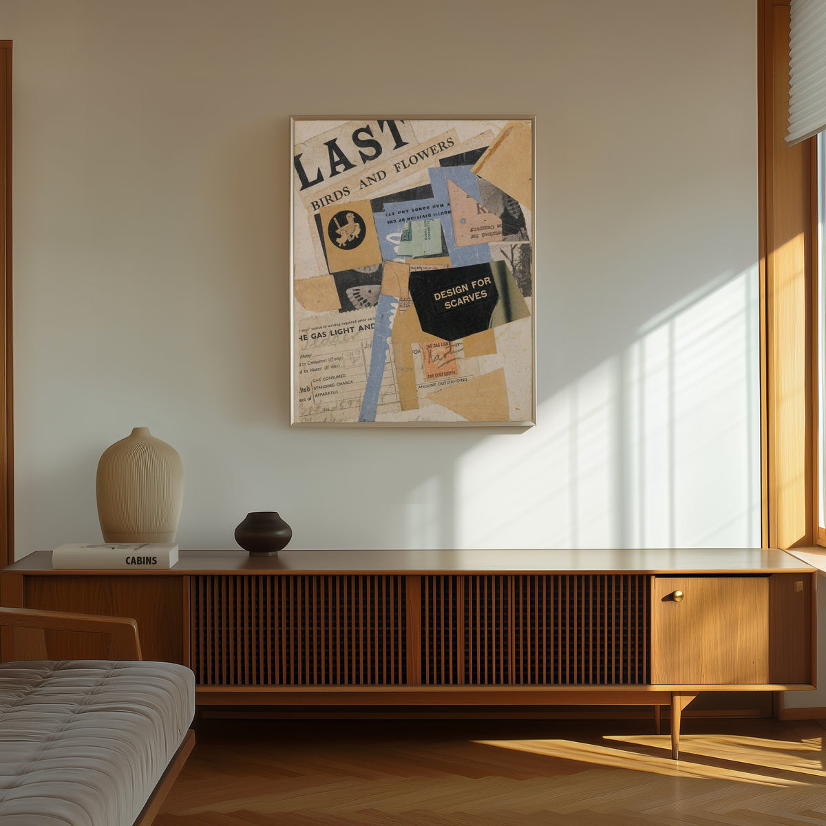 Framed art print of C 50 Last Birds And Flowers by Kurt Schwitters, in a thin light frame on a sunlit wall above a wooden sideboard
