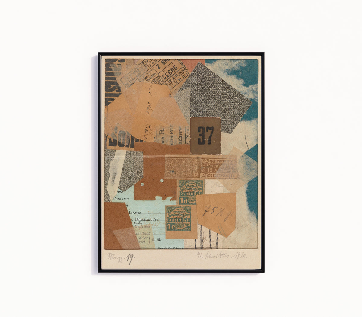 Framed art print of Merzz. 19 by Kurt Schwitters, in a slim black frame on a plain white wall
