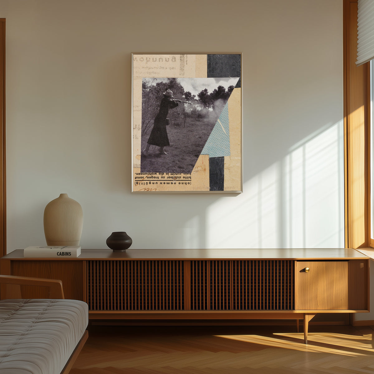Framed art print of Mit Jägerin, Merzzeichnung by Kurt Schwitters, in a thin light frame on a sunlit wall above a wooden sideboard