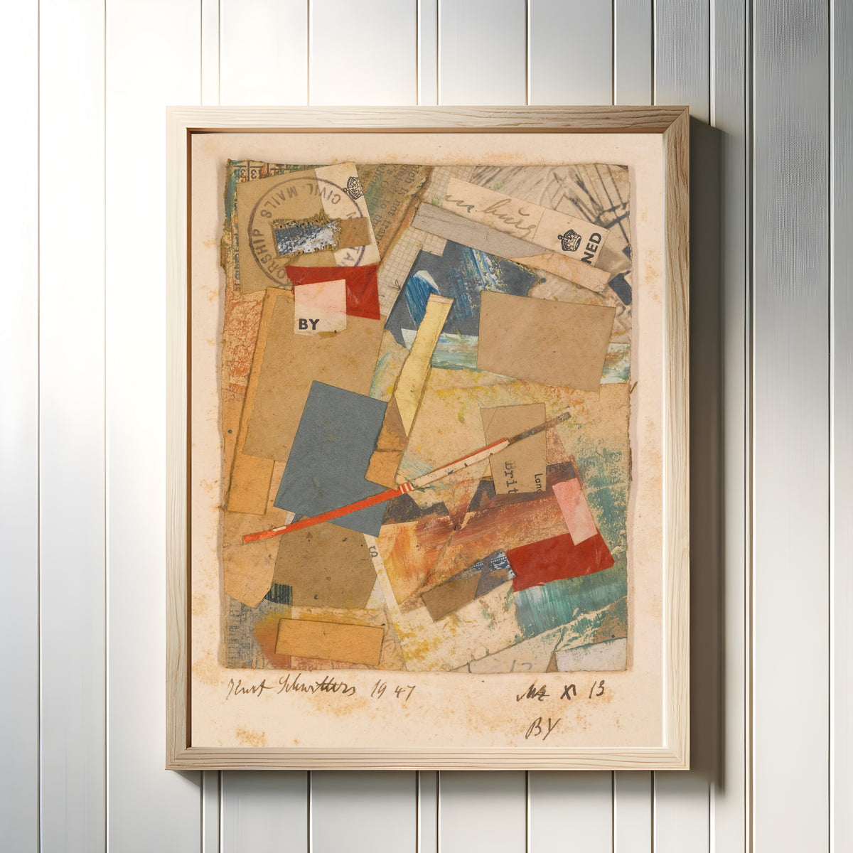 Framed art print of Mz X 13 by Kurt Schwitters, in a light wood frame on a white panelled wall