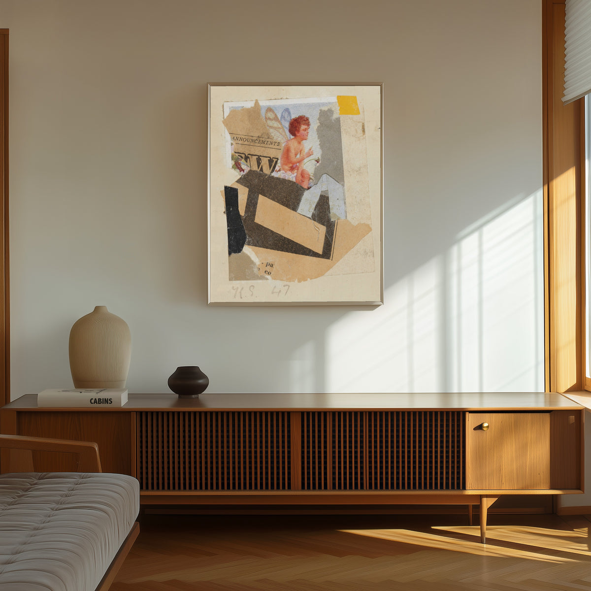 Framed art print of Ohne Titel (Ankündigungen) by Kurt Schwitters, in a thin light frame on a sunlit wall above a wooden sideboard