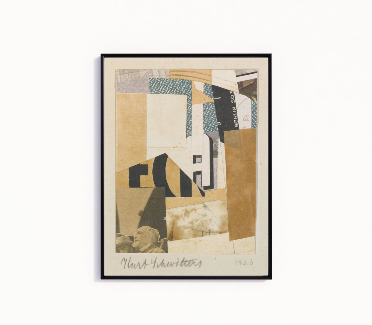 Framed art print of Ohne Titel, Berlin S 03 (Untitled, Berlin S 03) by Kurt Schwitters, in a slim black frame on a plain white wall