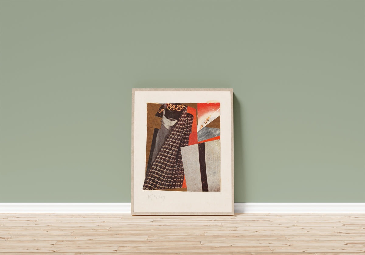 Framed art print of Ohne Titel (but but), Merzzeichnung by Kurt Schwitters, in a light wood frame leaning on a sage green wall above a wooden floor