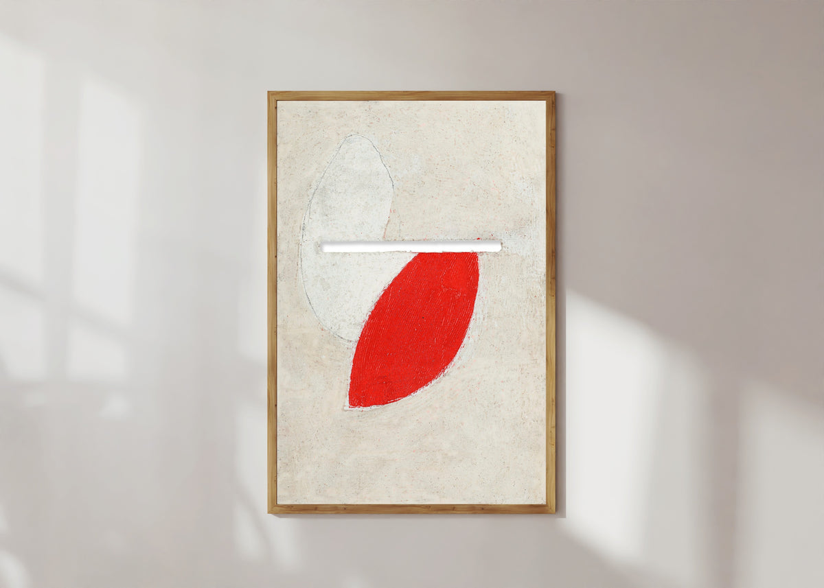 Framed art print of Ohne Titel (Mit Schlitz) by Kurt Schwitters, in a light wood frame on a sunlit white wall