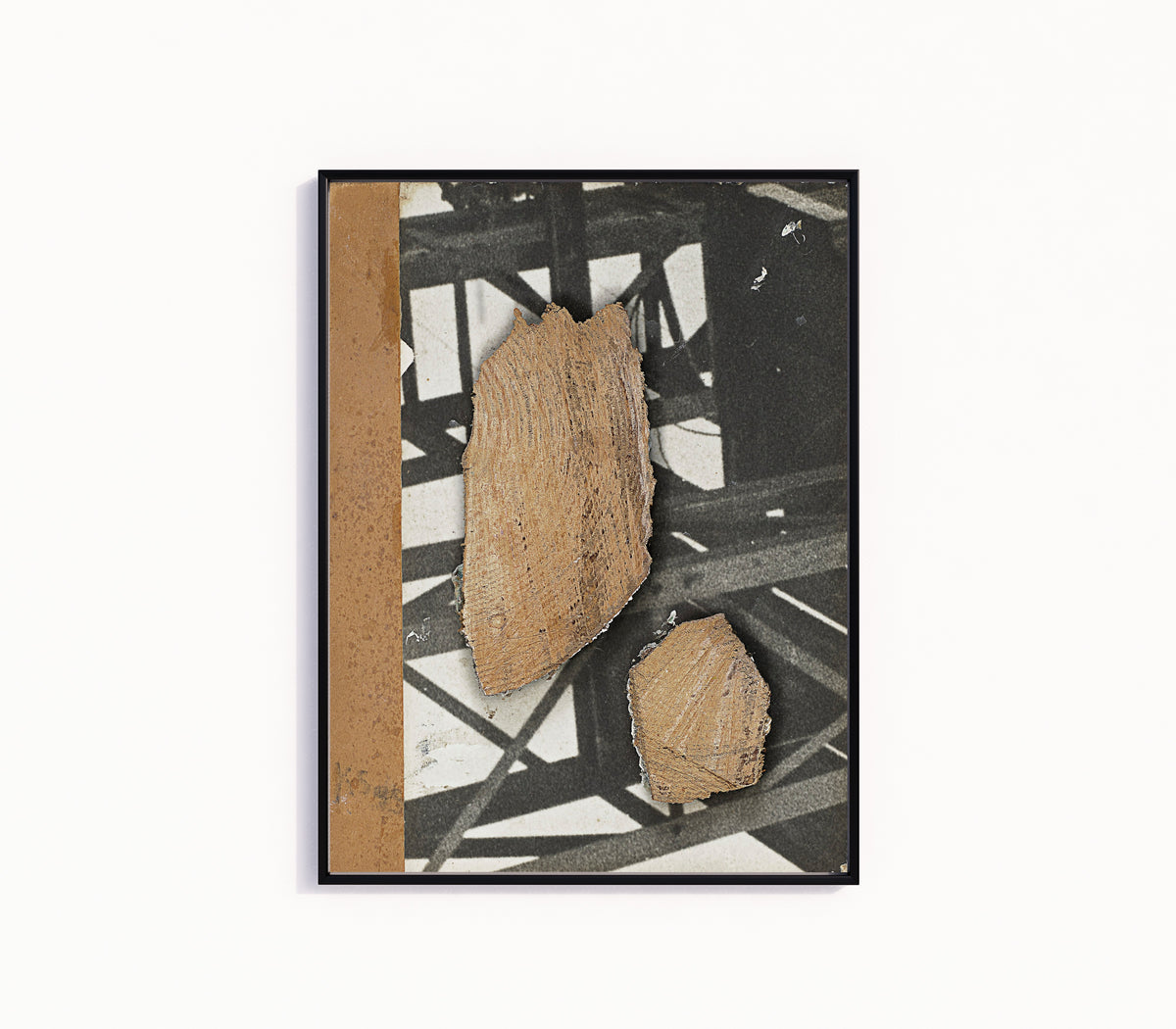 Framed art print of Ohne Titel (Mit Stahlträgerkonstruktion) by Kurt Schwitters, in a slim black frame on a plain white wall