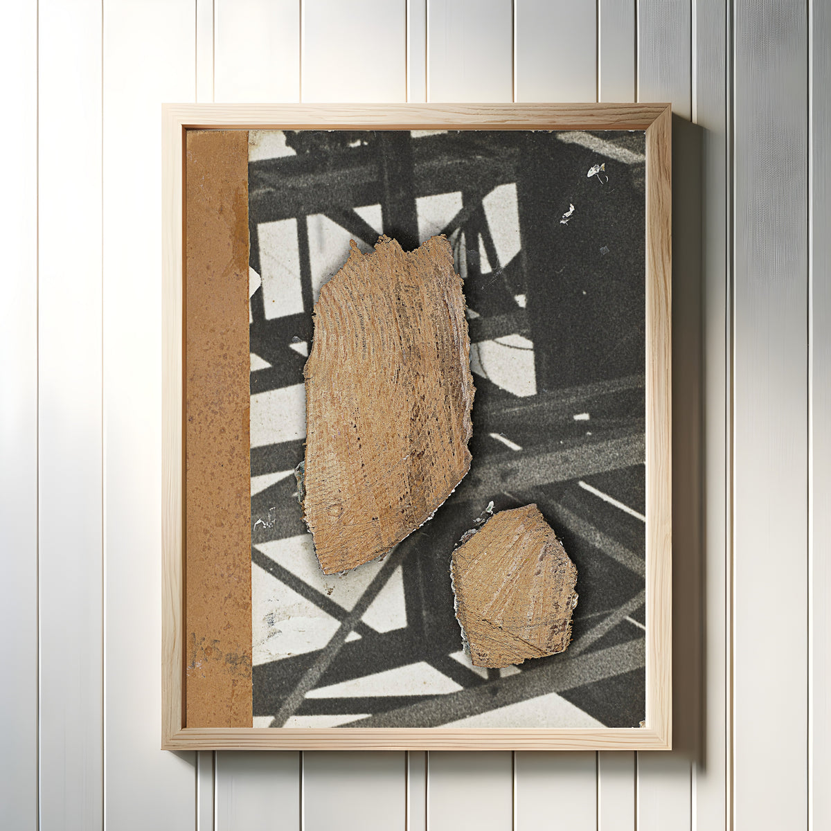 Framed art print of Ohne Titel (Mit Stahlträgerkonstruktion) by Kurt Schwitters, in a light wood frame on a white panelled wall