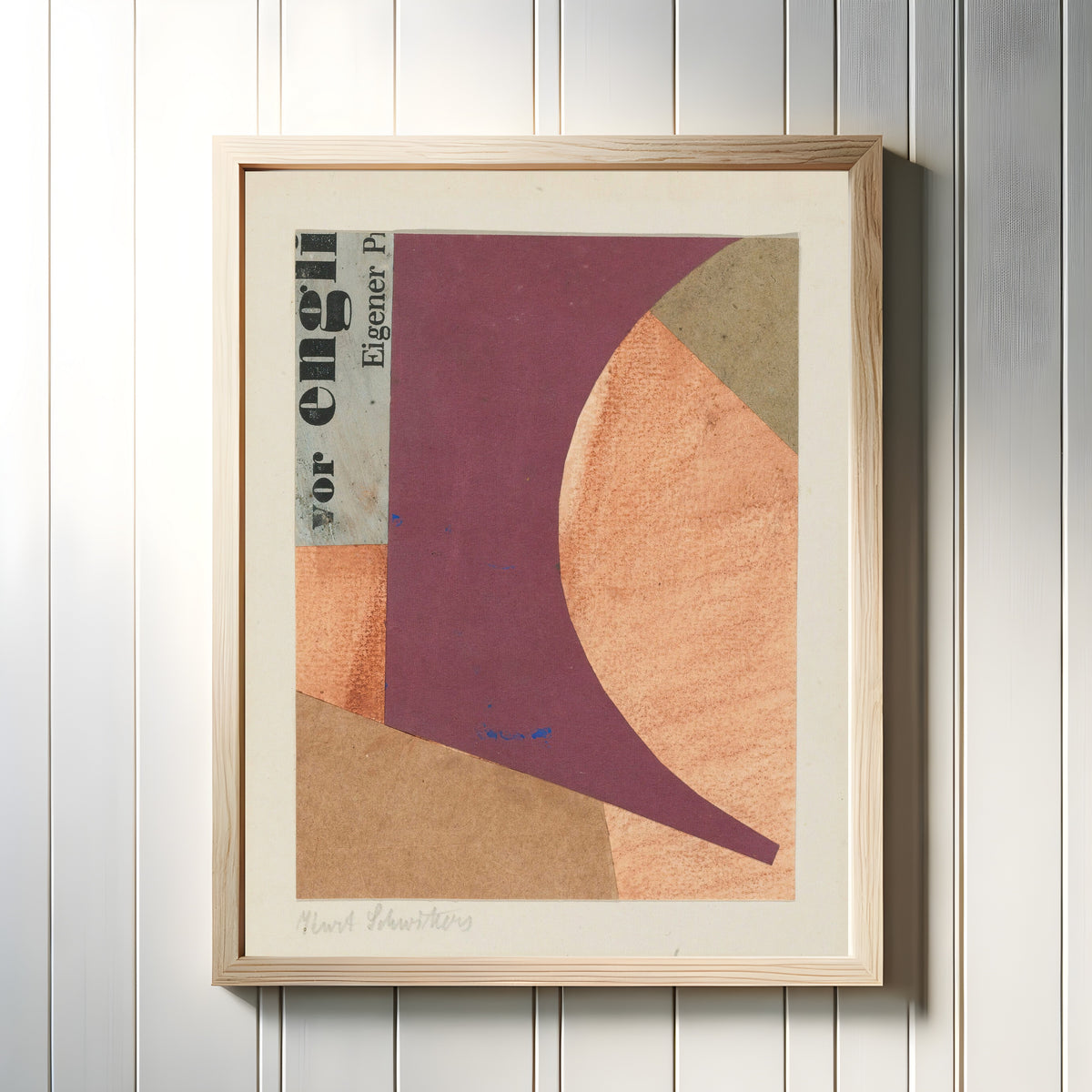 Framed art print of Ohne Titel (Vor Engli Eigener P) by Kurt Schwitters, in a light wood frame on a white panelled wall
