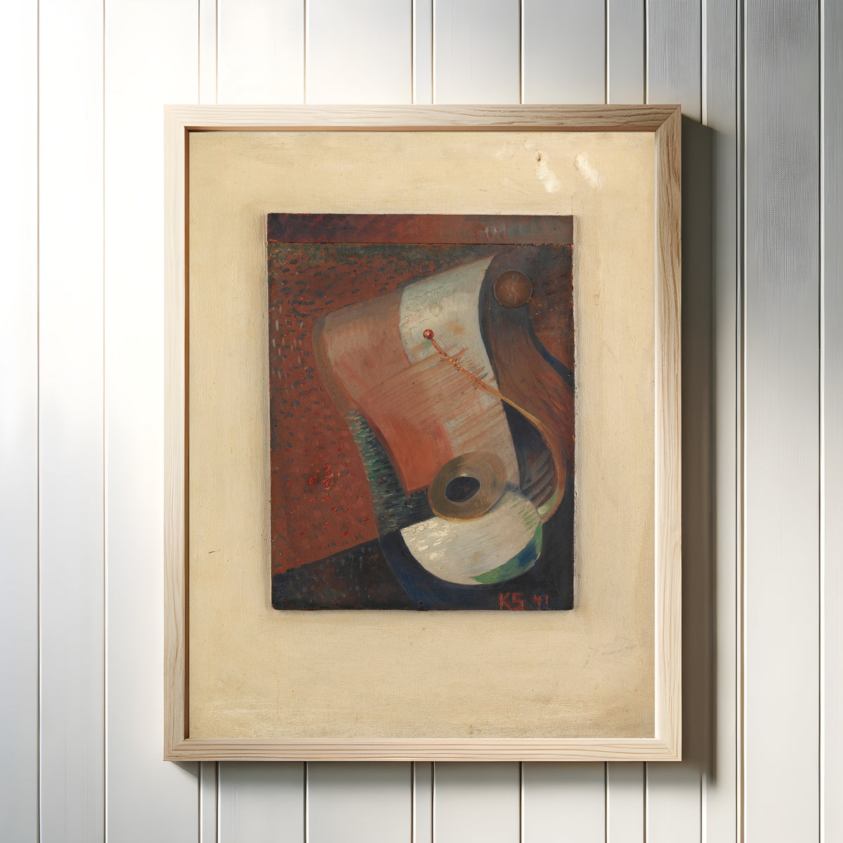 Framed art print of Still life with penny by Kurt Schwitters, in a light wood frame on a white panelled wall