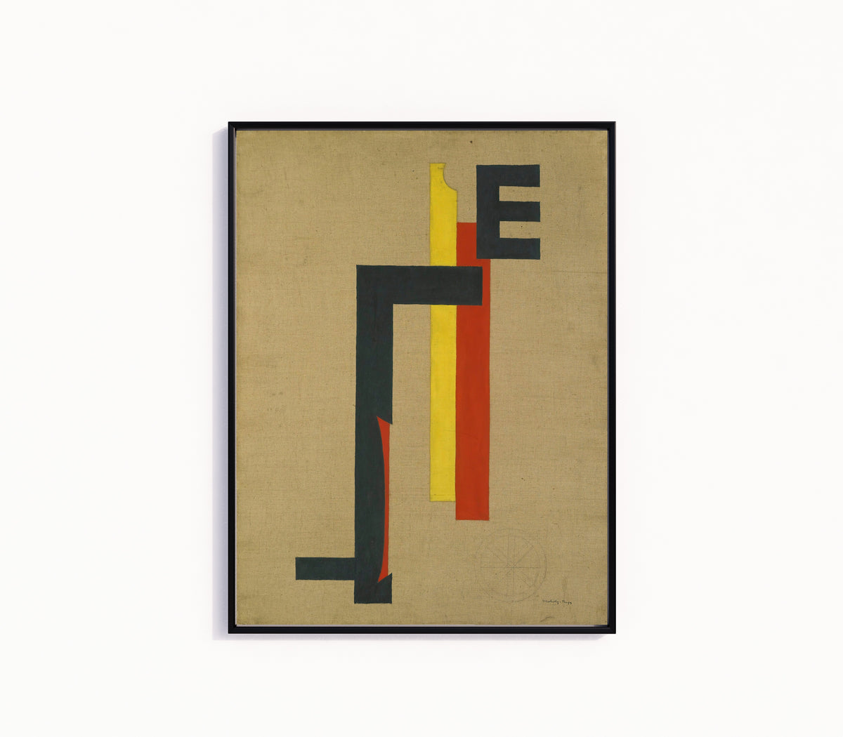Framed art print of E-Bild (E Picture) by László Moholy-Nagy, in a slim black frame on a plain white wall