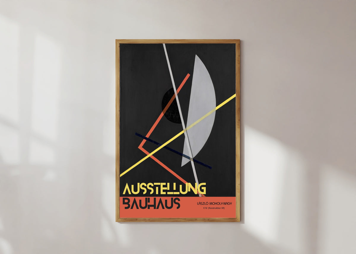 Framed art print of E IV (Konstruktion 8) by László Moholy-Nagy, in a light wood frame on a sunlit white wall