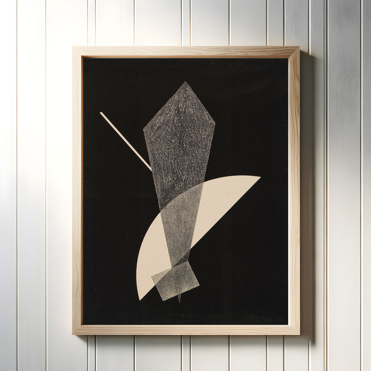Framed art print of Konstruktion V (1922–23) by László Moholy-Nagy, in a light wood frame on a white panelled wall