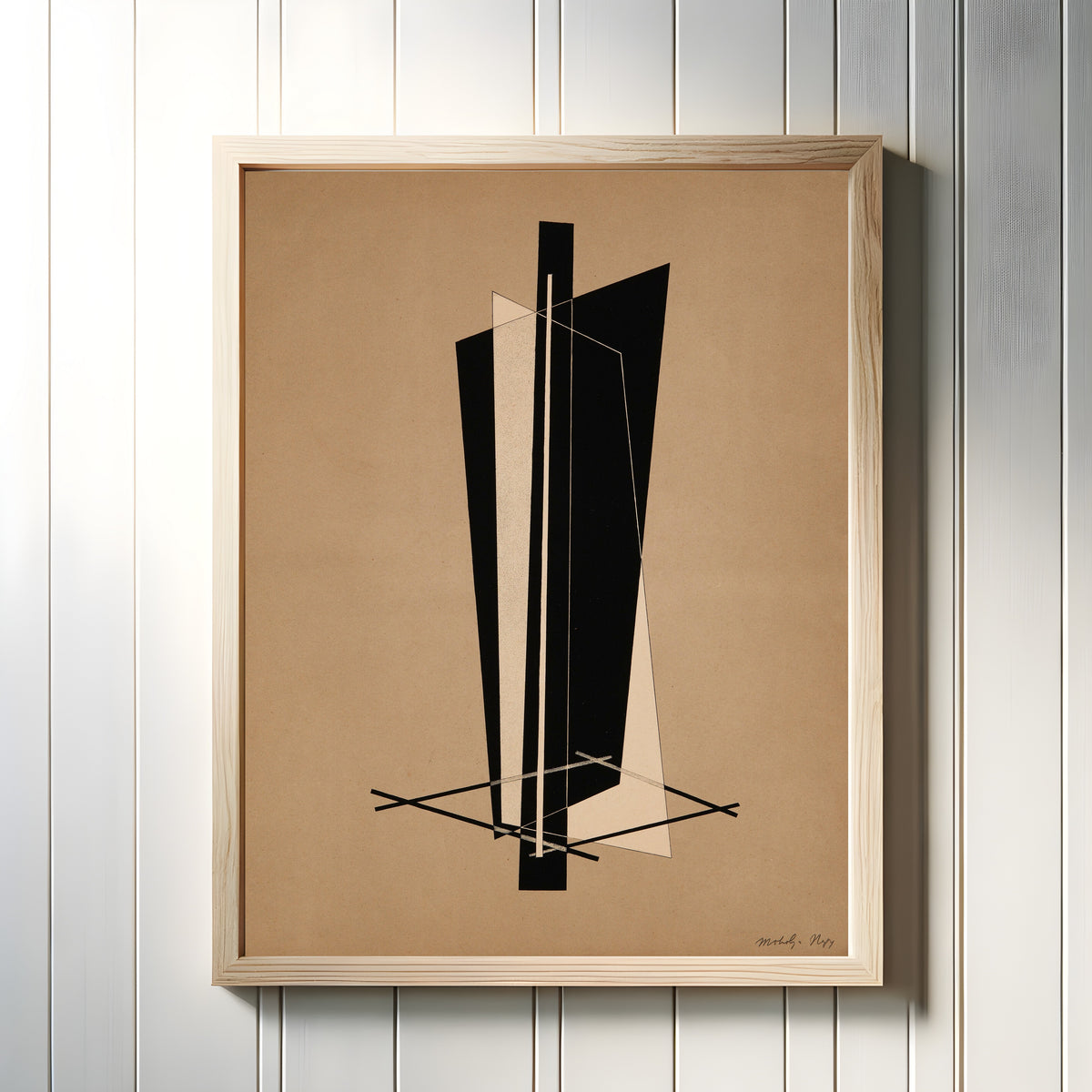 Framed art print of Konstruktion VI by László Moholy-Nagy, in a light wood frame on a white panelled wall