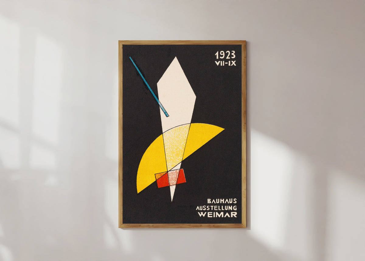 Framed art print of Weimar Bauhaus Postkarte Nr 7 by László Moholy-Nagy, in a light wood frame on a sunlit white wall
