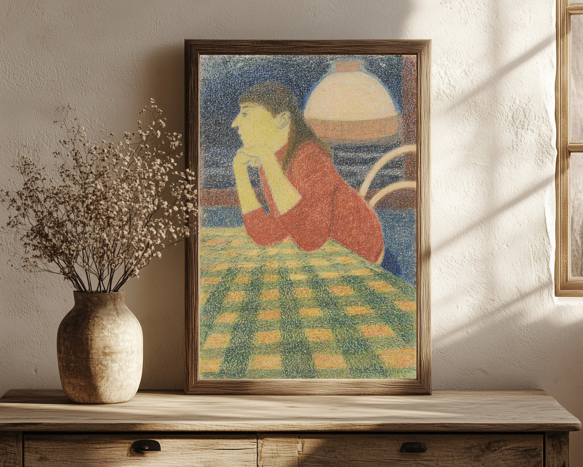Framed art print of Leunende vrouw by Léon Spilliaert, in a dark wood frame leaning on a rustic console beside dried flowers